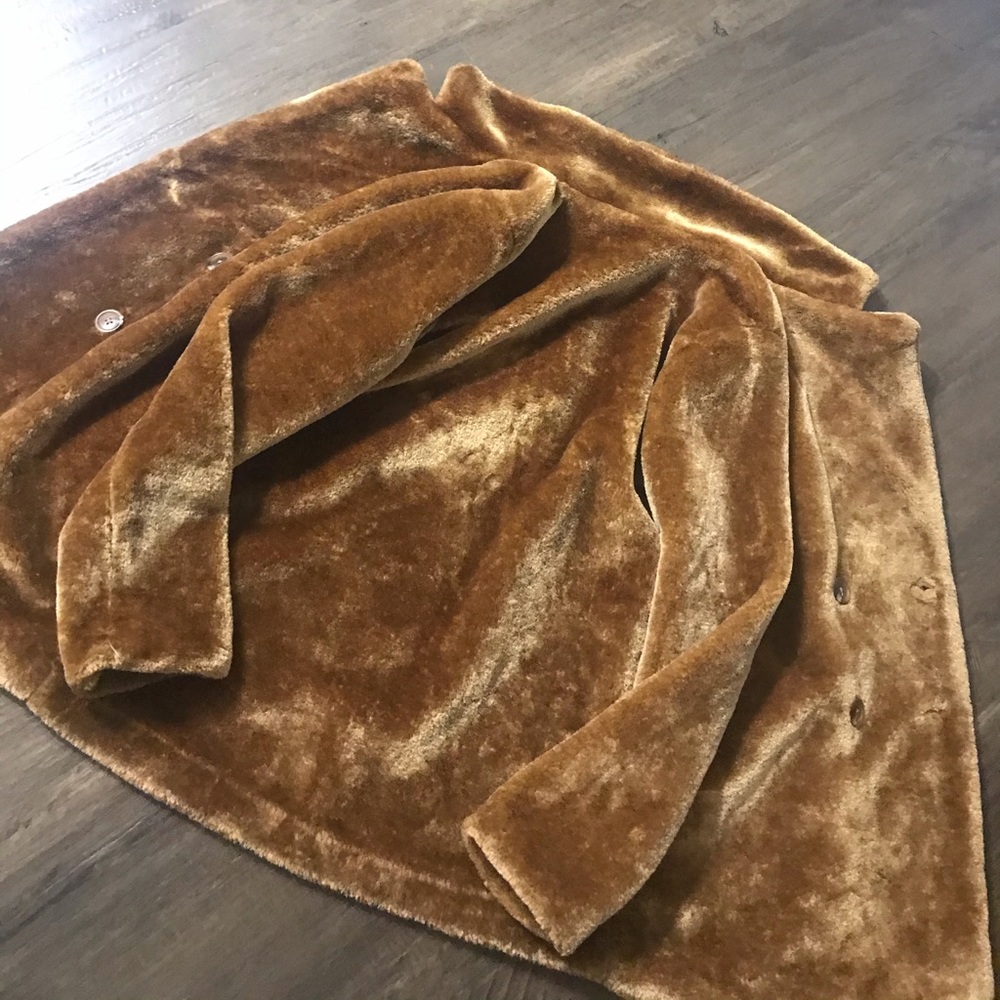 A velvet, fur jacket or Coat